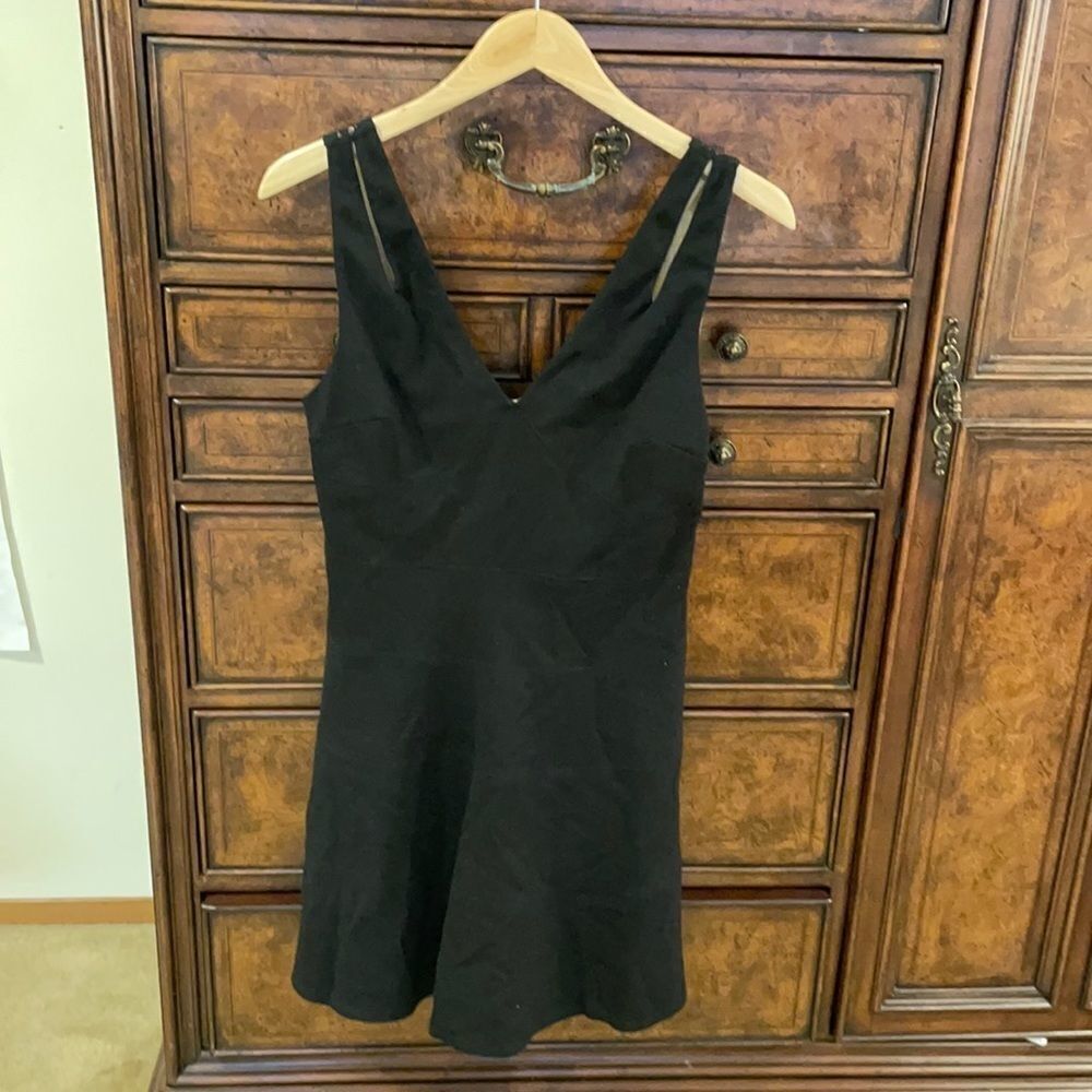 Ali and Jay woman’s black dress